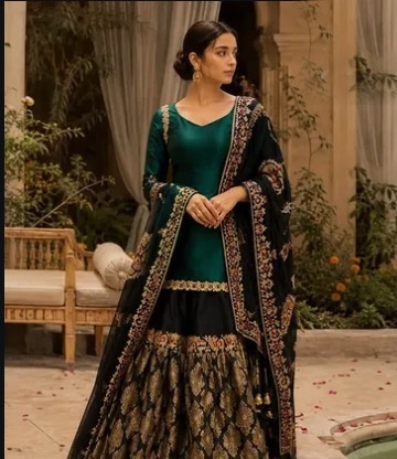 Couture by Bakhtawar — teal and black embellished bridal ensemble
